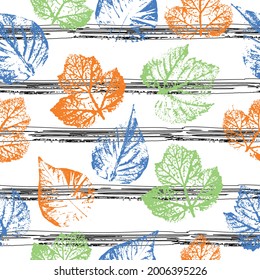 seamless pattern of leaves prints in color of autumn leaves on a white background crazy beautiful watercolor pattern of leaves. Fabric texture.