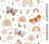 Seamless pattern with leaves and rainbow on a white background. Autumn pattern for fabric, wallpaper, gift paper. Pastel colors pattern. Orange and brown pattern.