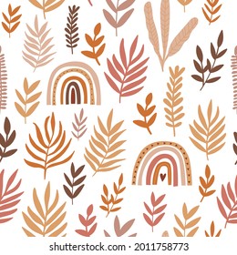 Seamless pattern with leaves and rainbow on a white   background.  Autumn pattern for fabric, wallpaper, gift paper. Pastel colors pattern. Orange and brown pattern.