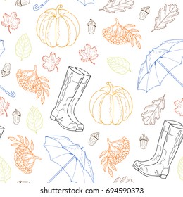 Seamless pattern from leaves, rubber boots, umbrella, mountain ash, pumpkin, acorn on a white background. Hand drawing. Vector illustration.