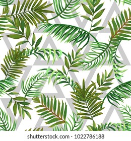 Seamless pattern with leaves of tropical palms and triangles