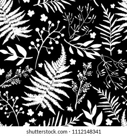 Seamless pattern with leaves. Vector floral set with hand drawn silhouettes of white foliage and flowers on black. Design for prints and textile.