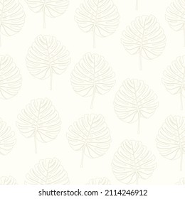 Seamless pattern of leaves in vector on a beige background 