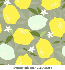 Seamless pattern with lemon fruits, branches and leaves. Print with healthy fruits. Contemporary minimalistic ornament with vegan natural food. Vector graphics.