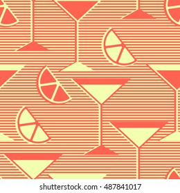 Seamless pattern with lemon or orange sections and martini glasses in striped background. 