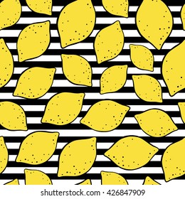 Seamless pattern with lemons on a striped background.