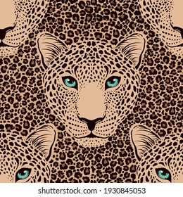 Seamless pattern with leopard muzzle and leopard fur.