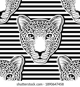 Seamless pattern with leopard muzzle on striped background.