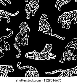 Seamless pattern. Leopard print. Trend print with wild cats. Leopard spots. Leopards and tigers are isolated on a black background. Hand drawn linear illustration.