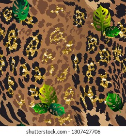 Seamless pattern - leopard skin with gold spangles and tropical leaves.