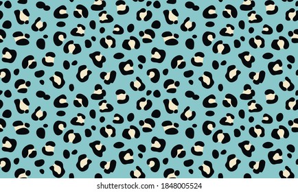 Seamless pattern of leopard texture background elements. Hand-drawn leopard texture in black and white color on a blue background. Trendy animalistic colorful background for textile, fabric, paper. 