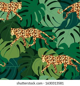 seamless pattern, leopards on a background of tropical leaves in various shades of green. vector illustration. EPS 10.