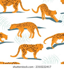 Seamless pattern with leopards. Predatory cats on a natural tropical print. Vector graphics.