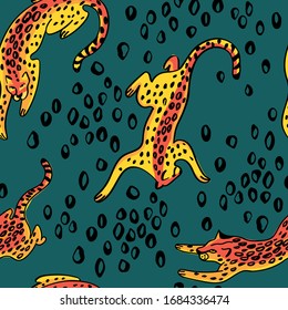 Seamless pattern with leopards and spots of animal skin vector illustration on a dark background. Exotic texture.