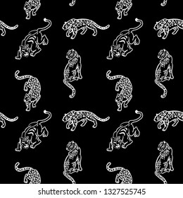 Seamless pattern. Leopards and tigers are isolated on a black background. Cute illustration of a wild cats. Hand drawn linear illustration.