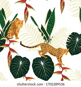 Seamless pattern with leopards, tropical leaves and paradise flowers. Trendy style. Vintage background.