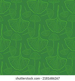Seamless pattern with light green ginkgo biloba leaves on green background. Vector image.