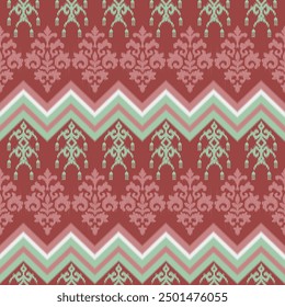 Seamless pattern in light red and green tones with elegant zigzag and damask stripes and imitation of ikat weaving.
