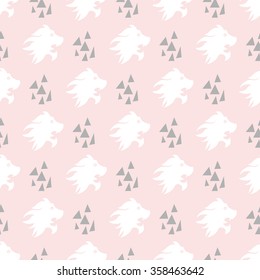 Seamless pattern with lion head and triangles