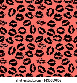 Seamless pattern of lip prints on coral backgraund.Kisses of black lipstick for Valentine day, Kiss day and love theme. Lips imprints on black background. Vector illustration.