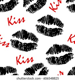 Seamless pattern with lips and text "kiss".