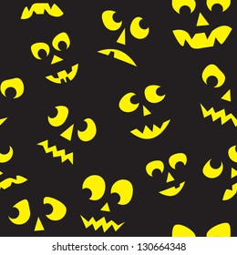A seamless pattern of lit Jack O Lantern faces surrounded by darkness.
