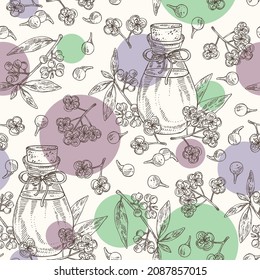 Seamless pattern with litsea cubeba: plant, flowers, litsea cubeba berries and bottle of litsea cubeba essential oil. Cosmetic, perfumery and medical plant. Vector hand drawn illustrati