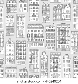 Seamless pattern with little hand drawn houses