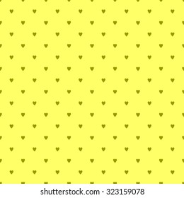 Seamless pattern with little hearts in the style of polka dot on a yellow background with lemon mustard heart