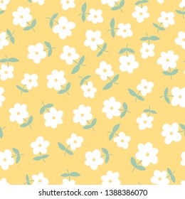 Seamless pattern with little white flowers on yellow background.