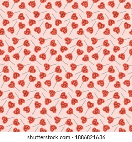 Seamless pattern with lollipops on pink background. Valentines day concept