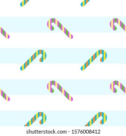 Seamless pattern of lollipops on striped background. Festive repeating background with candies. Merry Christmas and Winter holidays.