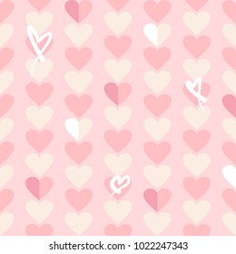 Seamless pattern of love hearts curly and by hand on a pink background