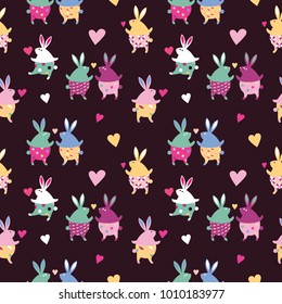 Seamless pattern. Lovely funny rabbits on a date. Enamored rabbits walk and dance. Greeting card. Ideal for Easter and St. Valentine's Day.