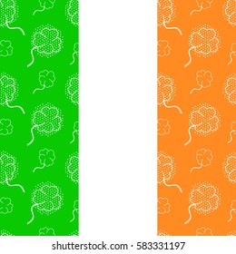Seamless pattern with lucky clover on the Irish flag background