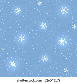Seamless pattern of luminous snowflakes on a blue background. Winter snowing illustration, holiday vector texture. Merry Christmas and Happy New Year. Repeat design useful for print, cover, wrapping