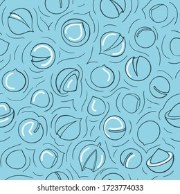 A seamless pattern with macadamia nuts on a blue background.