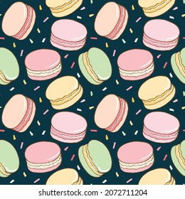 Seamless Pattern of Macaron Design on Dark Blue Background