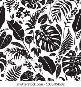 Seamless pattern made with black silhouettes of tropical leaves and flowers on white background. Tropic folage texture.Vector flat illustration.