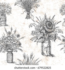 Seamless pattern made with bouquets of wildflowers and dried herbs.  Hand drawn rustic decoration. Monochrome vector sketch. 