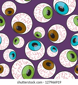 A seamless pattern made up of creepy eyeballs staring into different directions.