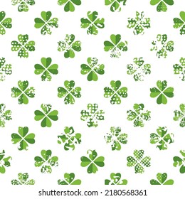 Seamless pattern made from grunge cloverleaves