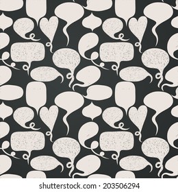 Seamless pattern made of hand drawn speech bubbles on chalkboard background. Tiling background with doodle cartoon comic bubbles.