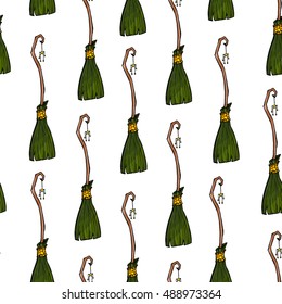 Seamless pattern made of hand drawn cute cartoon witch brooms.