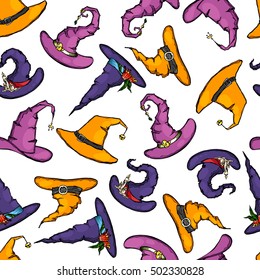 Seamless pattern made of hand drawn cute cartoon witch hats.