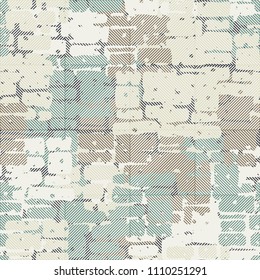 A seamless pattern made up of inaccurate multicolored rectangles arranged in random order. Texture in camouflage style. The picture is overlaid with a network of large squares with diagonal stripes.