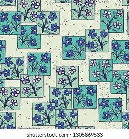 Seamless pattern made up of inflorescences inscribed into squares.