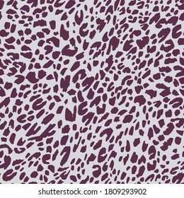 Seamless pattern made of leopard spots skin texture. African animal fur background. Spotted ornament. Vintage style. Good for wrapping, banner, fashion, textile and fabric.