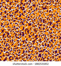 Seamless pattern made of leopard spots skin texture. African animal fur background. Spotted ornament. Vintage style. Good for wrapping, banner, fashion, textile and fabric.