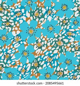 Seamless pattern made of leopard spots skin mixed with floral texture. African animal fur background overlay on daisy buds. Spotted ornament. Vintage style.